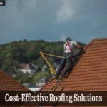 Cost-Effective Roofing Solutions for Budget-Conscious Homeowners - Your Source for the Latest Housing Trends | Housing Market News| Roofers working on residential home using cost-effective roofing solutions for durability and savings