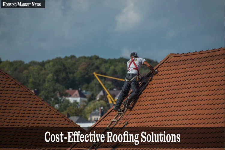 Roofers working on residential home using cost-effective roofing solutions for durability and savings