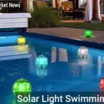 Solar light swimming pool with floating solar lights and underwater LED illumination for eco-friendly pool glow.