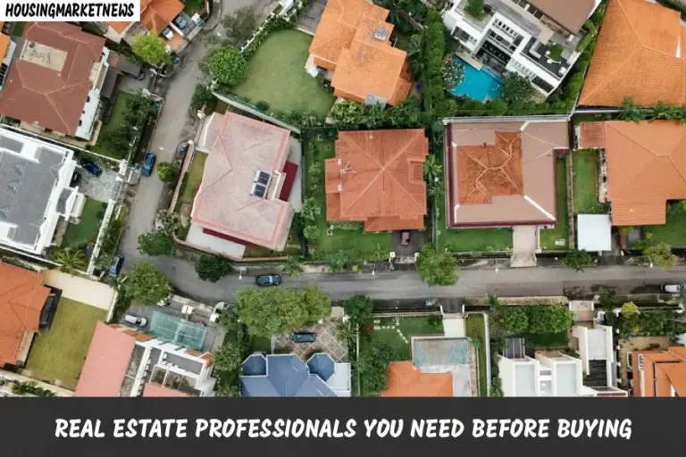 Real estate professionals helping buyers during a property purchase