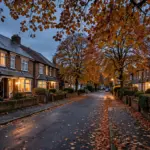 Victorian red-brick terraced houses beside London-style townhouses on a UK residential street