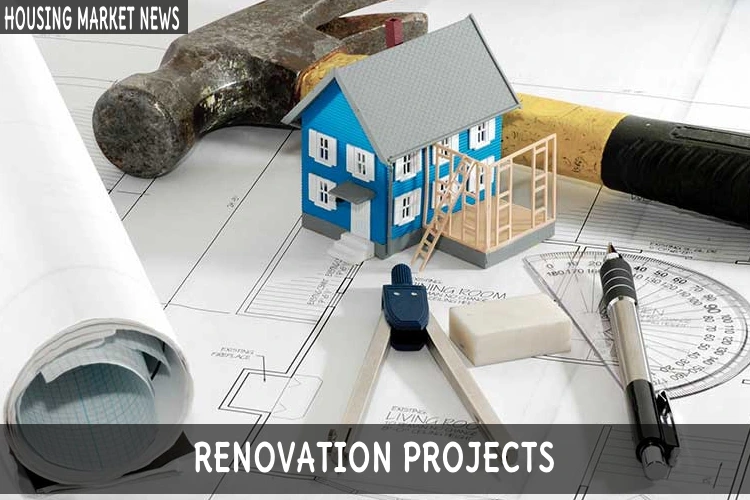 Exterior home renovation project featuring updated siding and landscaping