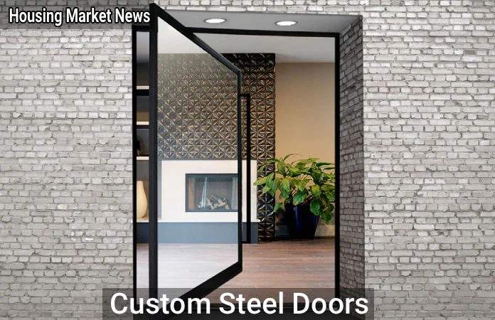 Modern custom steel door with frosted glass panels and a sleek black finish on a suburban home’s entryway.